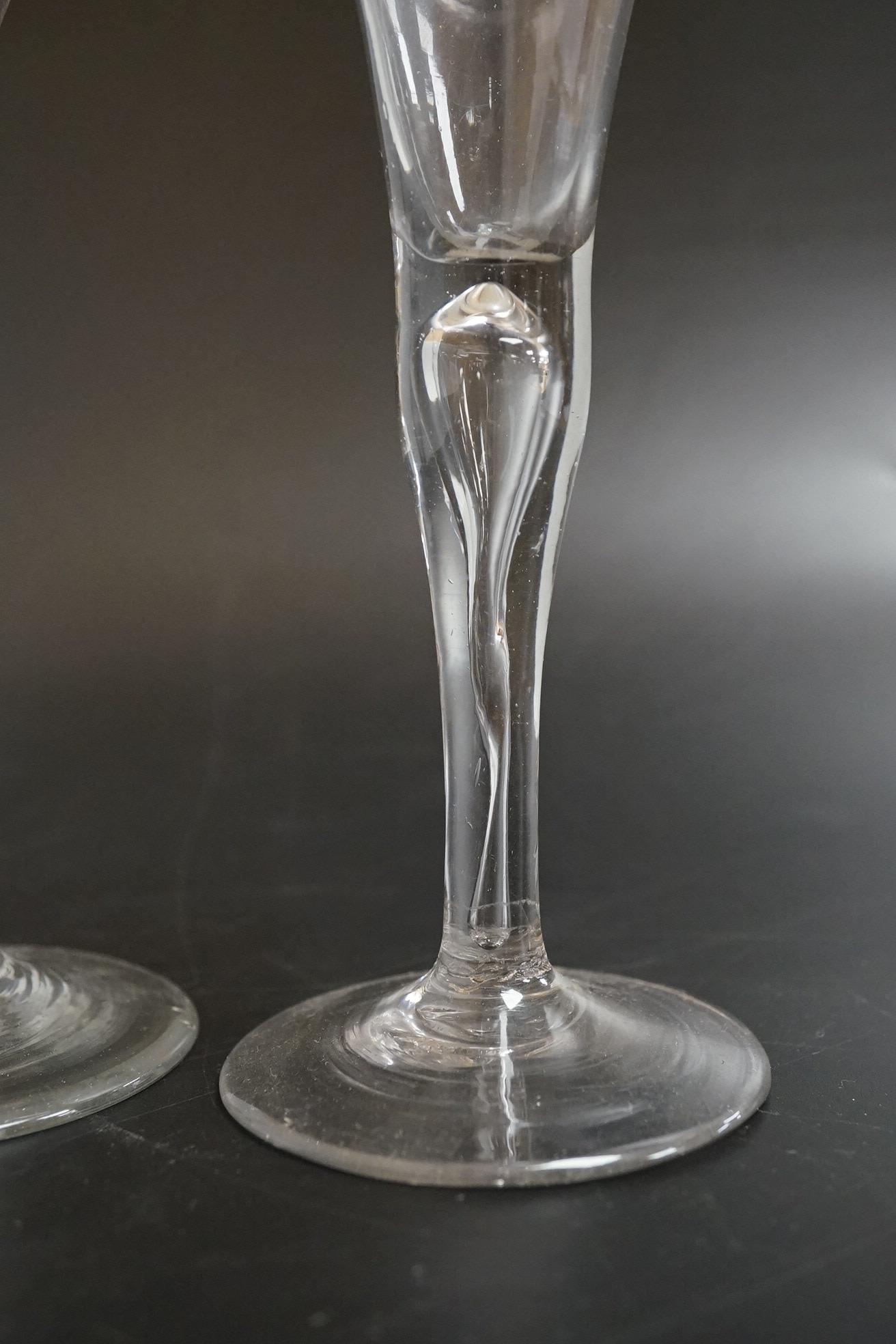 Two drawn wine glasses, each with air-tear stems, and a drawn-stem wine glass with blue internal twist, tallest 17cm high (3)